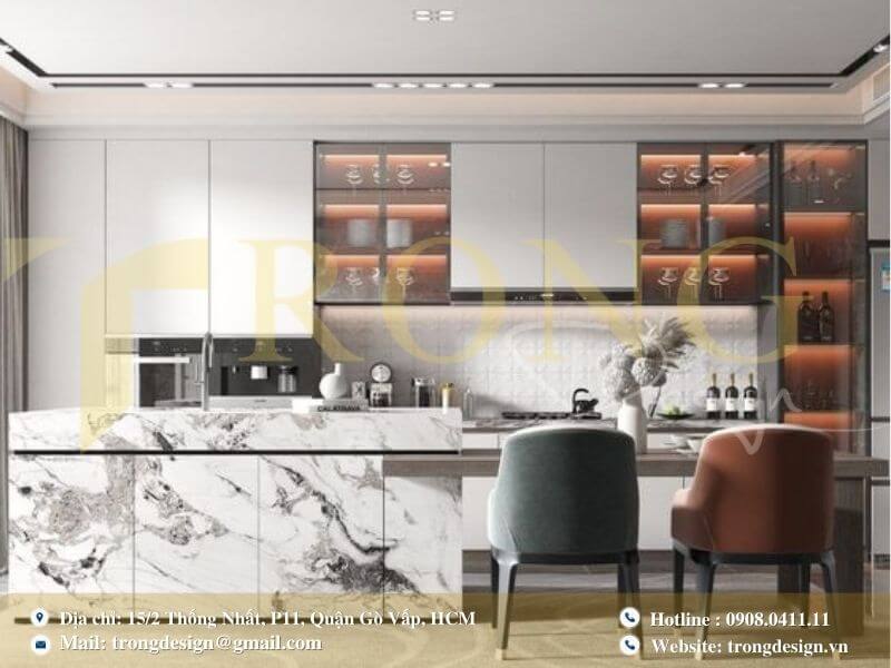 Bếp hiện đại, tối giản với đảo bếp lớn và tông màu trắng chủ đạo.