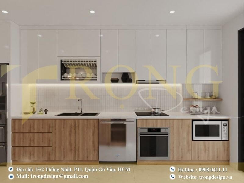Bếp hiện đại với sự kết hợp hài hòa giữa tủ trắng bóng và tủ gỗ vân tự nhiên.