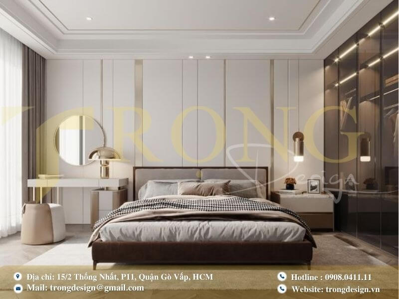 Phòng ngủ thanh lịch với tủ quần áo kính và góc trang điểm tiện nghi.