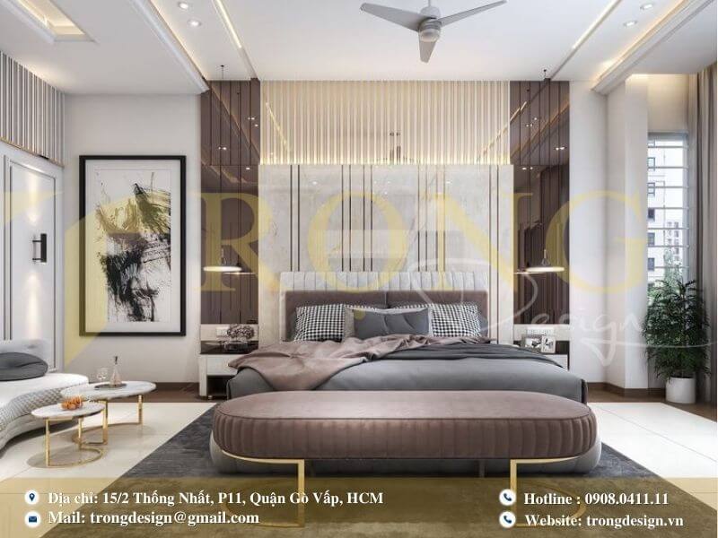 Phòng ngủ hiện đại sang trọng với điểm nhấn vàng đồng và vật liệu cao cấp.