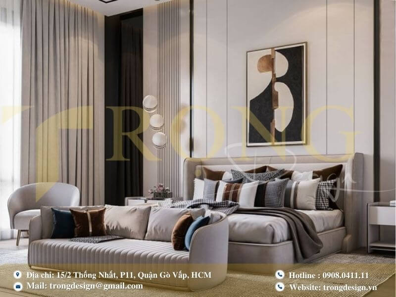 Phòng ngủ sang trọng với sofa thư giãn và thiết kế tường tinh tế.