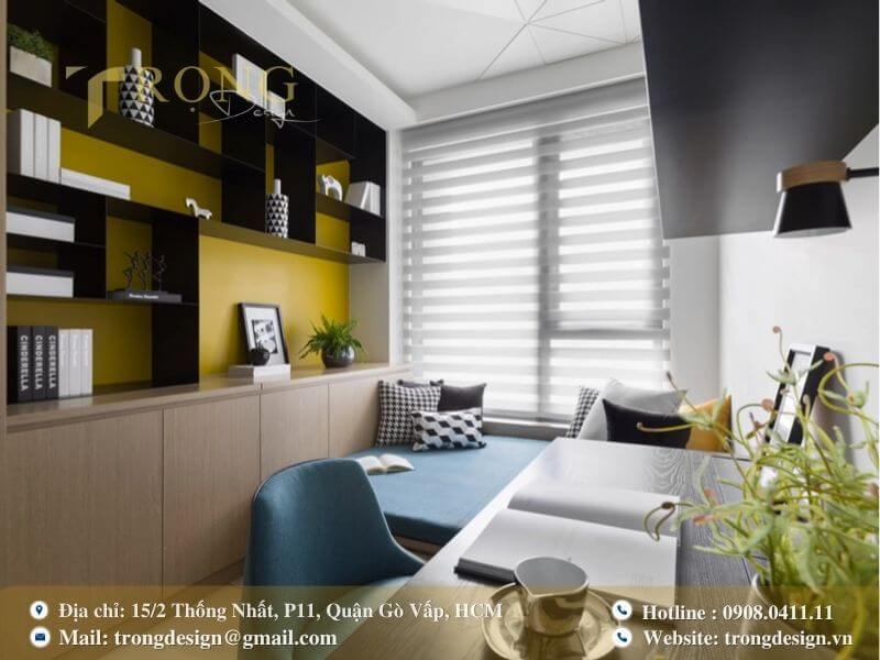 Phòng ngủ khách hiện đại, năng động với kệ sách độc đáo và góc làm việc.