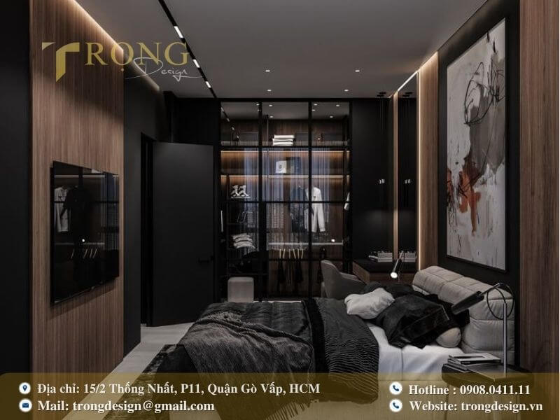 Phòng ngủ hiện đại, sang trọng với tủ quần áo kính lớn và tông màu tối.