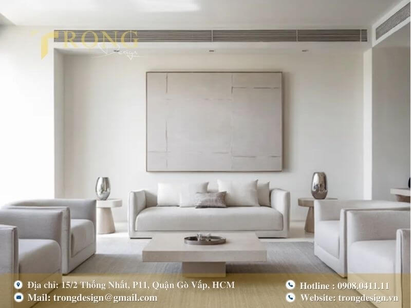 Phòng khách tối giản, hiện đại với nội thất đơn sắc và bố cục đối xứng.