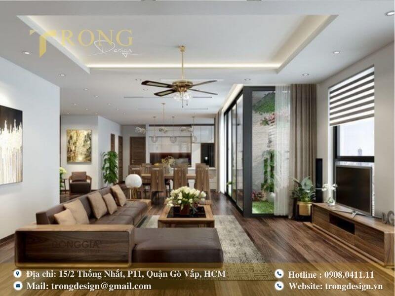 Phòng khách ấm áp, hiện đại với không gian mở và nội thất gỗ óc chó.