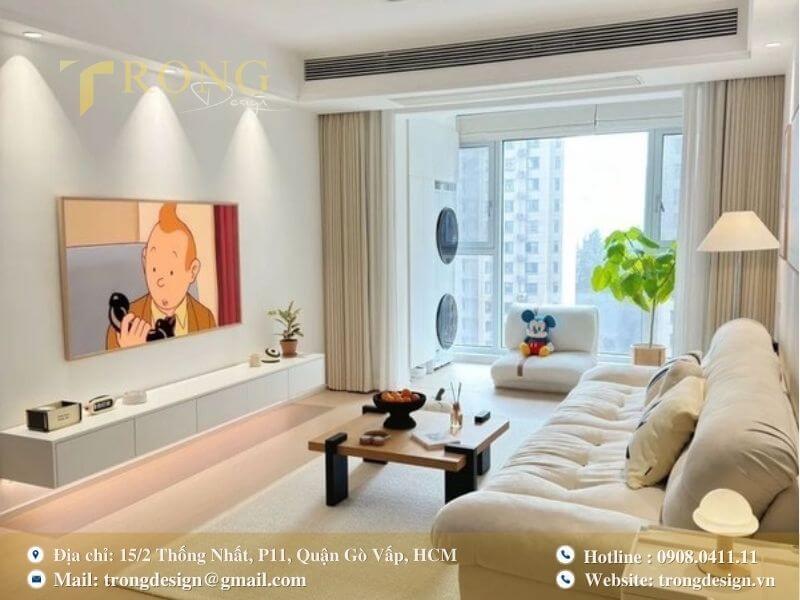 Phòng khách tối giản, gọn gàng, phù hợp cho vợ chồng có con nhỏ.