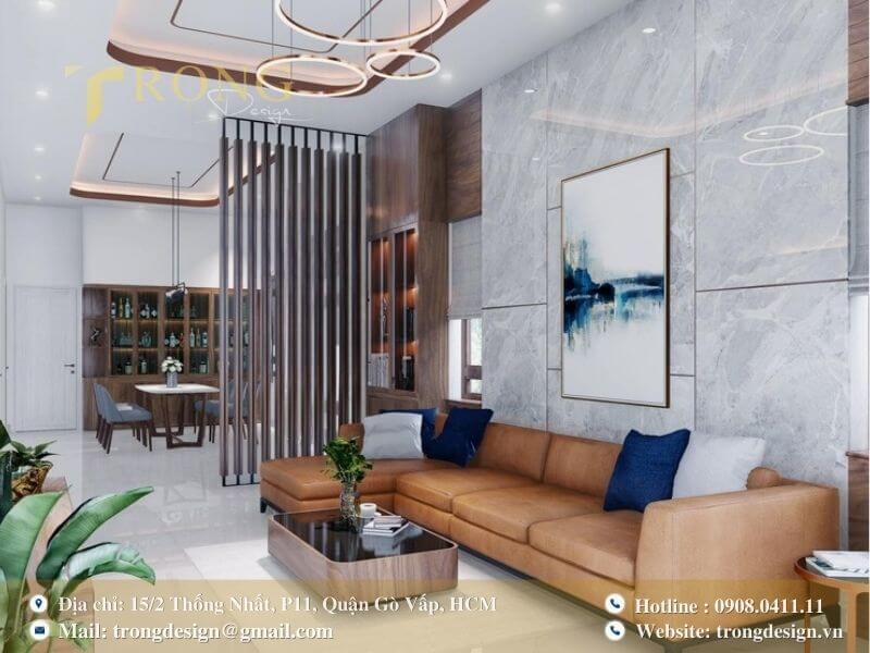 Phòng khách nhà phố hiện đại với điểm nhấn từ vật liệu đá cẩm thạch.