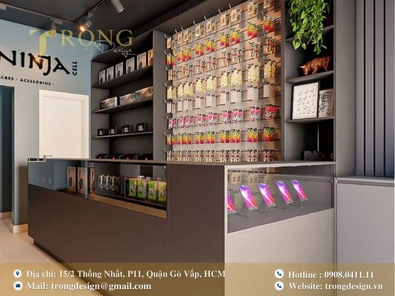 Thiết kế cửa hàng cá tính, màu than chì kết hợp xanh và ánh đèn spotlight ấm áp.