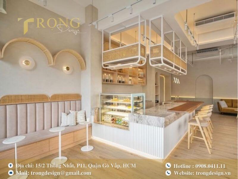 Quán trà sữa hiện đại, nhẹ nhàng với sự kết hợp tinh tế của gỗ và đá.