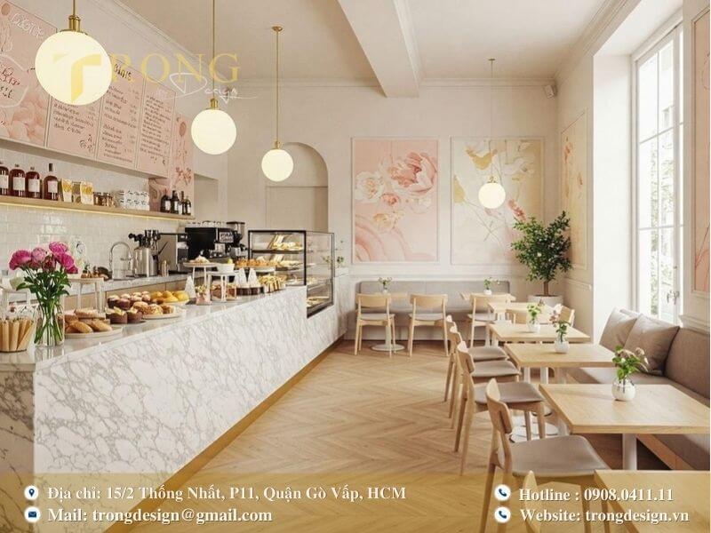 Quán trà sữa cổ điển, lãng mạn với tông màu hồng pastel và tranh hoa.