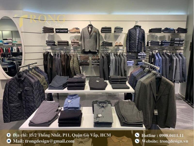 Cửa hàng thời trang nam hiện đại, trưng bày theo tông màu chuyên nghiệp.
